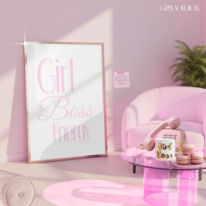 Pink room with ‘Just a Girl Boss Energy' poster, pink chair, and 'Girl Boss" coffee mug.