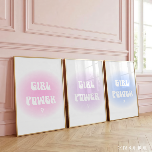 Girl Power aura gradient typography print displayed in three colour options, including soft pink, lavender purple, and dreamy pastel blue, with a female symbol on a clean white borderless background.