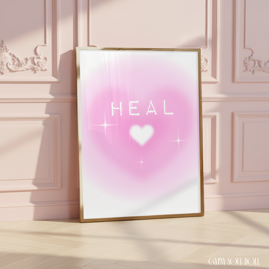Minimalist A4 print featuring the text Heal in a glowing white font over a soft, airbrushed pastel pink aura heart with a white heart centre and sparkle icons.