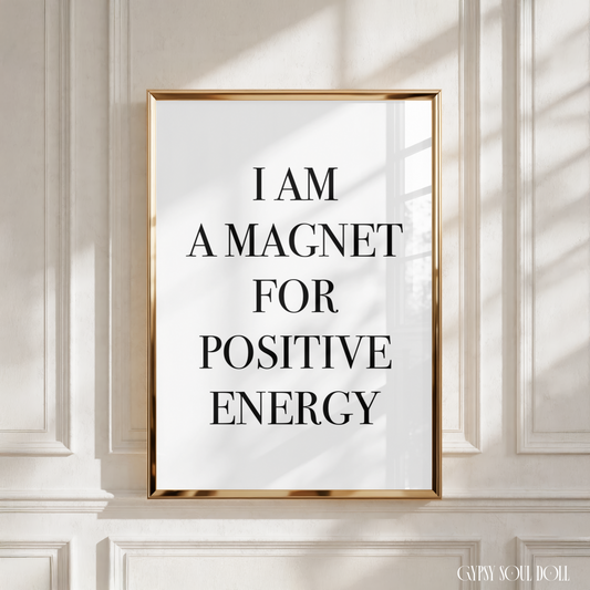 Minimalist A4 affirmation print featuring bold black text reading I AM A MAGNET FOR POSITIVE ENERGY against a clean, crisp white background.