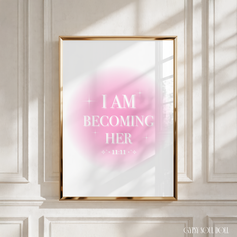 Minimalist A4 soft pink gradient aura poster for personal development displaying the text I Am Becoming Her with the 11:11 angel number reminder.