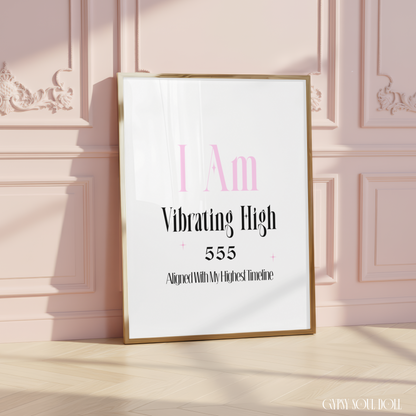 Minimalist A4 manifestation typography print with pink text reading I Am, bold black lettering reading Vibrating High, the gothic angel number 555, and the tagline Aligned With My Highest Timeline.
