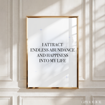 Spiritual typography print with a soft blue aura background reading I Attract Endless Abundance And Happiness Into My Life with delicate star glints.