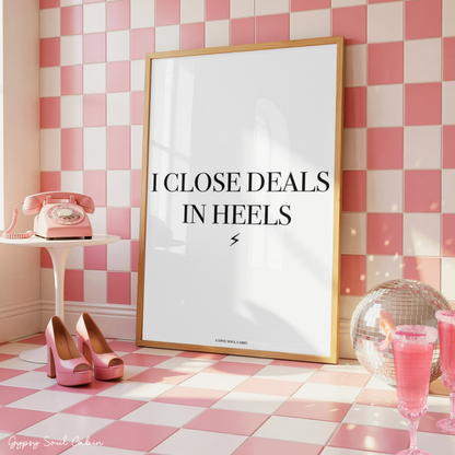Minimalist A4 fashion typography wall art print featuring the text I CLOSE DEALS IN HEELS in bold black lettering with a small lightning bolt icon on a clean white background.