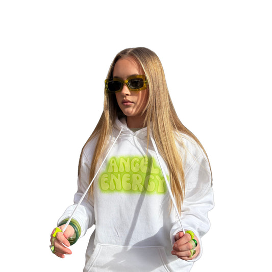 Model showcasing transparent, clear green Y2K-style sunglasses paired with a white graphic hoodie from Gypsy Soul Doll.