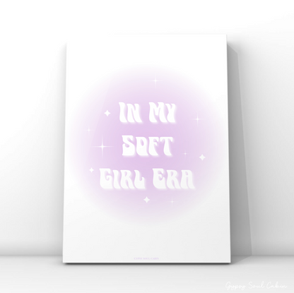 Spiritual pastel purple aura poster displaying retro groovy white typography reading In My Soft Girl Era accented by tiny magical sparkle icons.