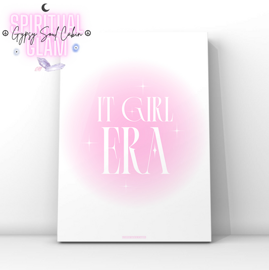 Pink gradient aura typography print featuring the bold text It Girl Era surrounded by glowing Y2K cosmic star sparkles.