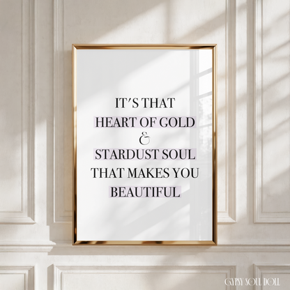 Minimalist black and white A4 typography print featuring the inspirational quote It's That Heart Of Gold & Stardust Soul That Makes You Beautiful with pastel pink highlight gradient.