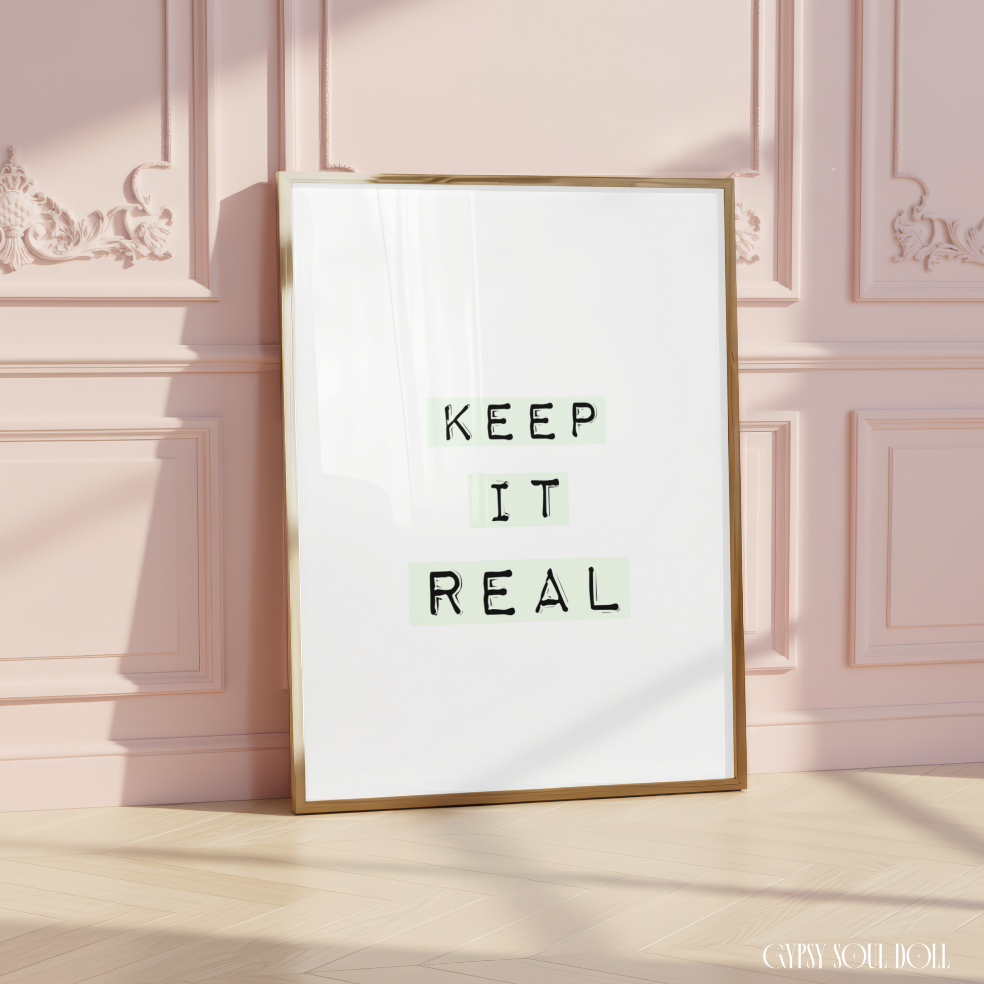 Minimalist typography art print reading Keep It Real with typewriter style font layered over soft pastel green gradient blocks.