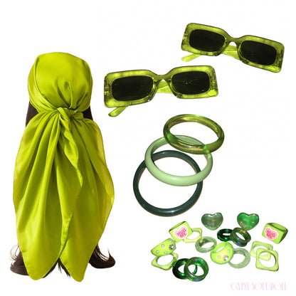 A curated Y2K brat girl summer accessory bundle featuring a lime green satin multi-way head scarf, two pairs of matching lime translucent rectangle sunglasses, a trio of chunky acrylic bangles, and an assortment of lime green resin rings, heart gems, and "Hug Me" bubble accent rings.