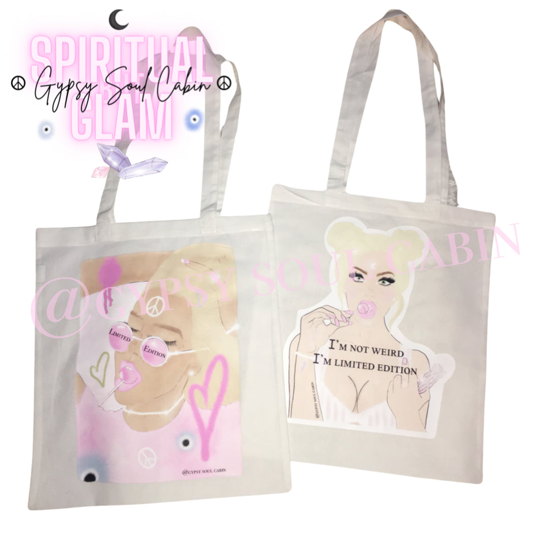 Two white canvas tote bags showing different female fashion graphic illustrations and quotes including I'm not weird I'm limited edition.