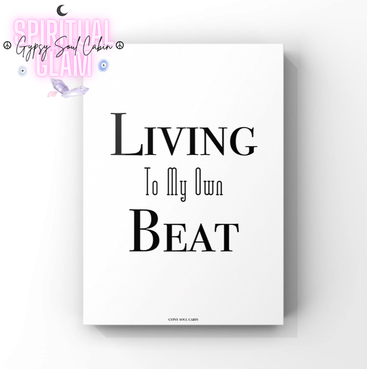 Minimalist monochrome typography poster print displaying the empowering mindset phrase Living To My Own Beat in a mix of serif and tall outline font styles.