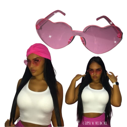 A pair of Gypsy Soul Doll Lovers Lane translucent bubblegum pink heart-shaped fashion glasses displaying a frameless Y2K coquette design against a plain white background.