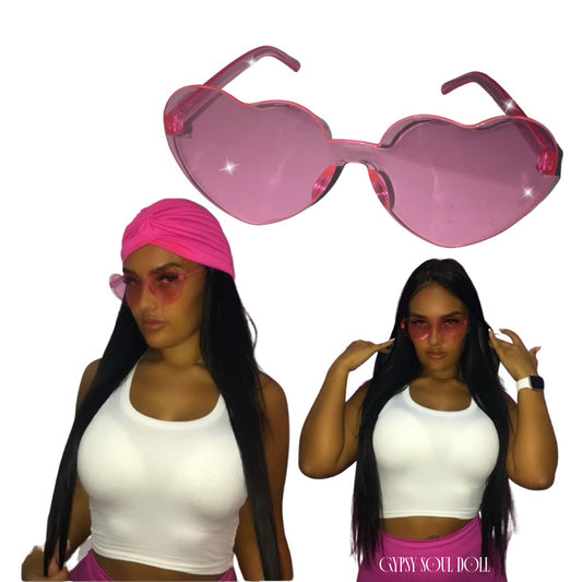 A pair of Gypsy Soul Doll Lovers Lane translucent bubblegum pink heart-shaped fashion glasses displaying a frameless Y2K coquette design against a plain white background.