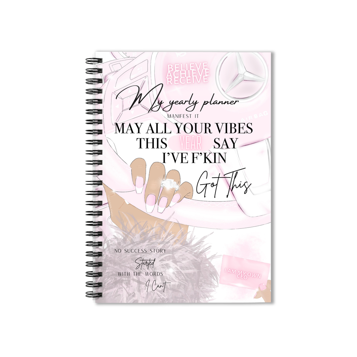 A spiral-bound notebook with a pink and white cover design featuring motivational text, a hand with manicured nails, and a Mercedes-Benz star logo, shown on a plain white background by Gypsy Soul Doll.