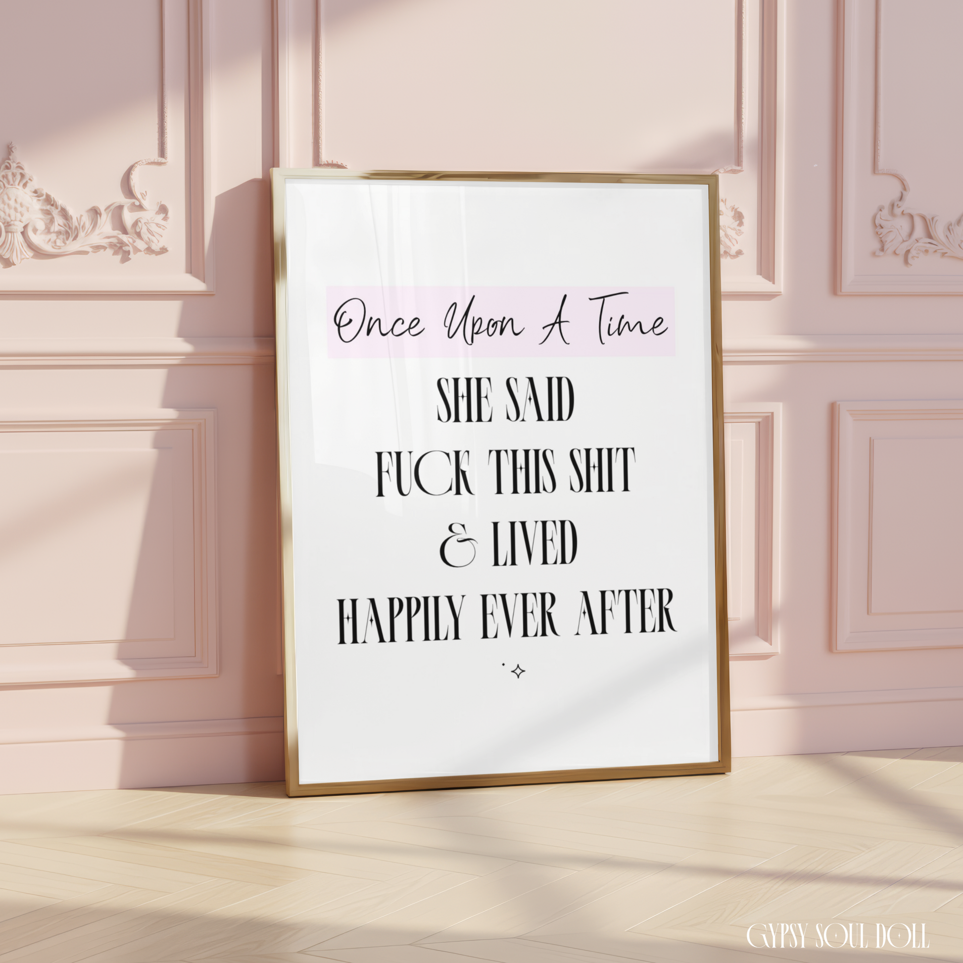 Sassy feminist wall art print reading Once Upon A Time She Said Fuck This Shit and Lived Happily Ever After in a bold black serif font with a soft pink banner highlight.