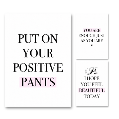 Three matching minimalist typography wall art prints, including Put On Your Positive Pants, You Are Enough, and P.S. I Hope You Feel Beautiful today, with bold black serif fonts and soft pink highlight banners on clean white backgrounds.