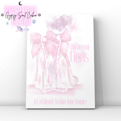 Glamorous pink high heels art print with satin bows and draped pearls, featuring the motivational typography quote Put On Your Heels & Get Ready To Run Your Empire.