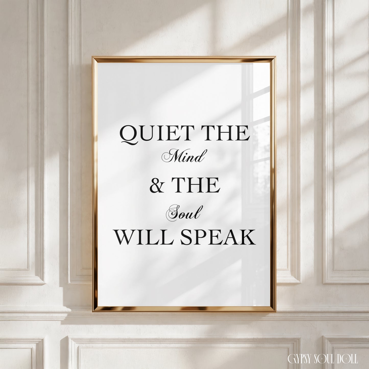 A minimalist poster print with a quote that reads ‘Quiet The Mind & The Soul Will Speak’ in black text on a white background, emphasising mindfulness and presence.