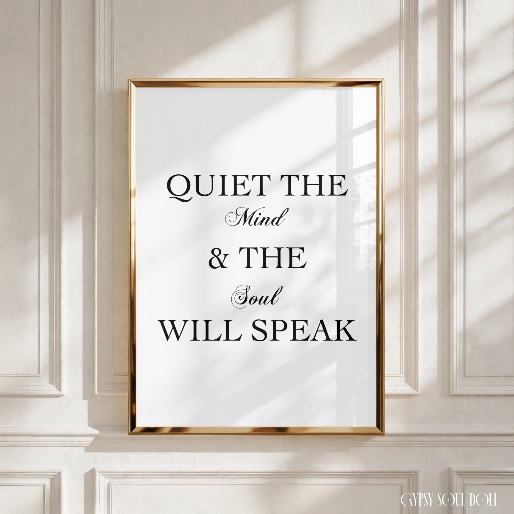 A minimalist poster print with a quote that reads ‘Quiet The Mind & The Soul Will Speak’ in black text on a white background, emphasising mindfulness and presence.