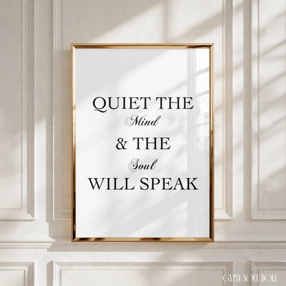A minimalist poster print with a quote that reads ‘Quiet The Mind & The Soul Will Speak’ in black text on a white background, emphasising mindfulness and presence.