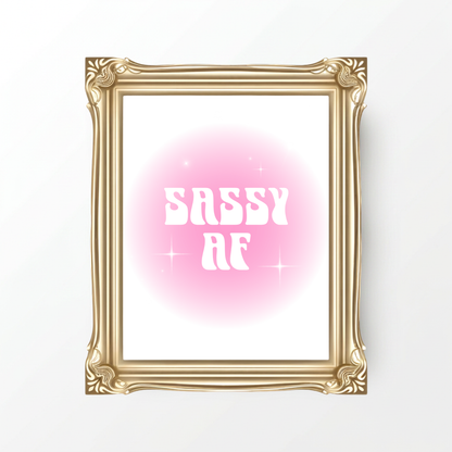 Sassy AF aura gradient typography print featuring a soft pink aesthetic glow, retro white lettering, and delicate star sparkle details on a clean white background.