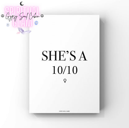 Minimalist black-and-white typography quote print featuring the text 'She's A 10/10,' with a small female Venus symbol detail for an empress bedroom theme.