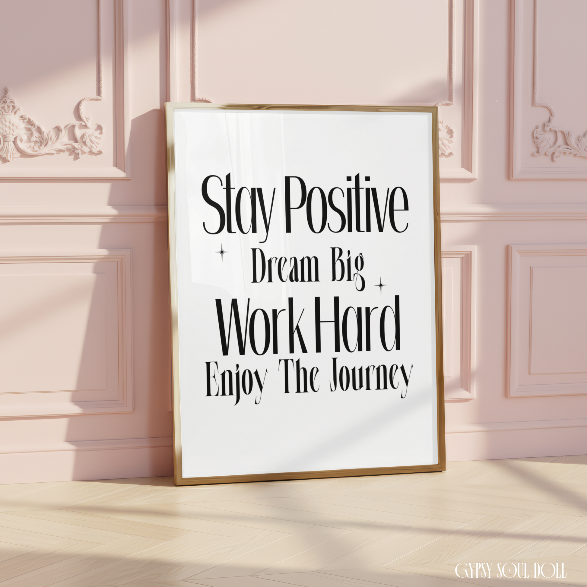 Minimalist A4 typographic wall art print featuring bold black text reading Stay Positive, Dream Big, Work Hard, and Enjoy The Journey decorated with small star icons.