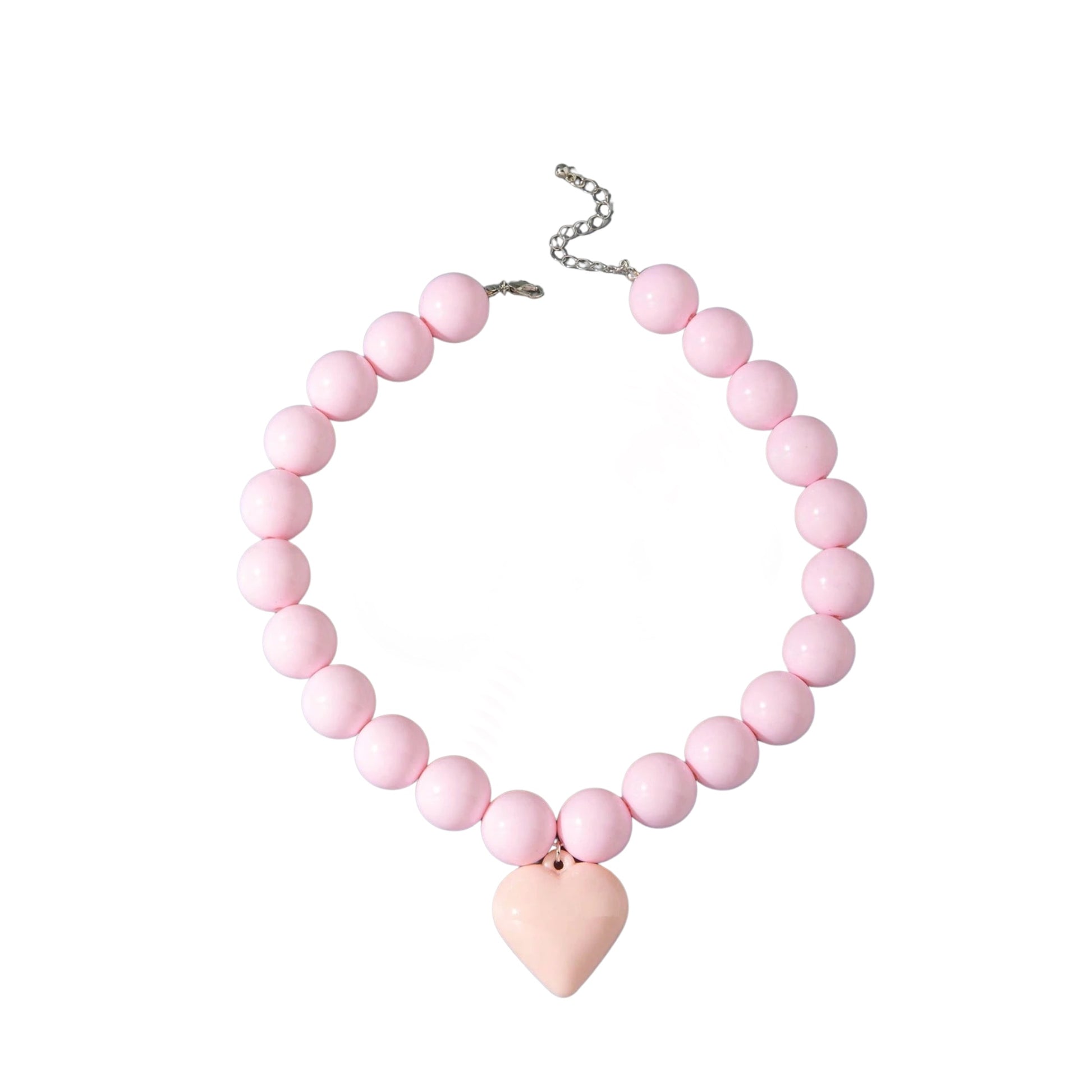 Studio product shot of the Gypsy Soul Doll pink chunky bubblegum resin bead necklace with a large matching pastel pink puffy heart pendant, showing its silver lobster clasp and adjustable metal chain extender against a plain white background.