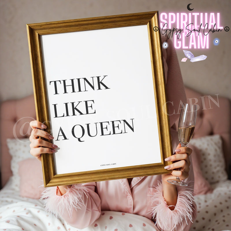 Minimalist A4 black and white typography print displaying the empowering quote Think Like A Queen held in a gold frame by a woman in pink feather pajamas holding champagne.