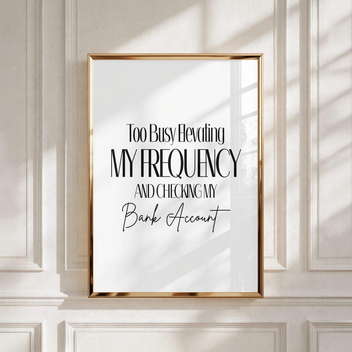 A4 vertical art print with a white background featuring tall black editorial serif typography combined with a black cursive script font that reads Too Busy Elevating MY FREQUENCY AND CHECKING MY Bank Account without punctuation.