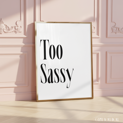 Minimalist A4 typographic wall art print featuring bold black stylised serif text reading Too Sassy, centred on a clean white background.