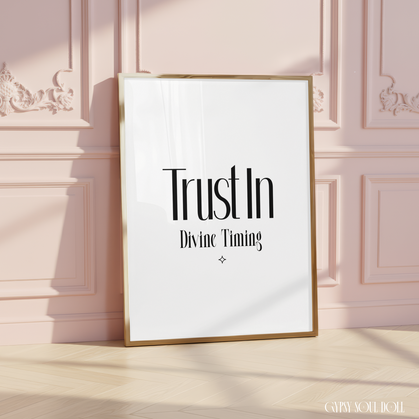Minimalist spiritual wall art print reading "Trust In Divine Timing," centred on a crisp background with a small matching protective diamond emblem.