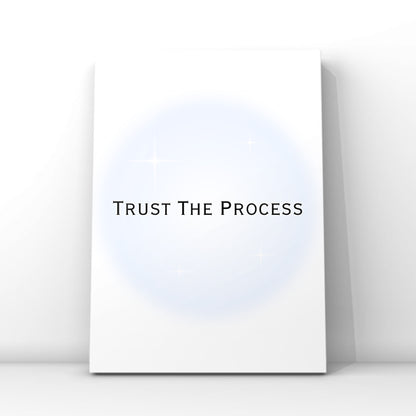 Independent doll motivation quote poster displaying the text Trust The Process in a modern font over a dreamy pastel blue aura circle.