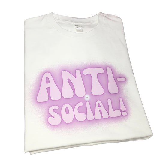 Front view of a folded premium white cotton crew-neck t-shirt featuring a custom purple fuzzy Y2K airbrush graphic print reading Anti-Social.